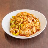 72) Calamari saltati con zenzero, cipollotti e poco peperoncino