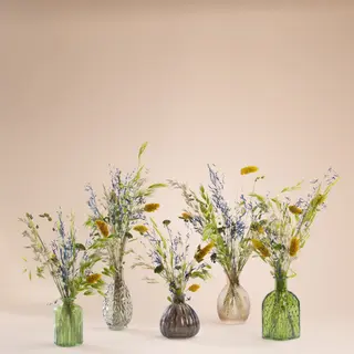 Fiori secchi su vasino in vetro verde