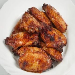 Alitas Y Muslos De Pollo