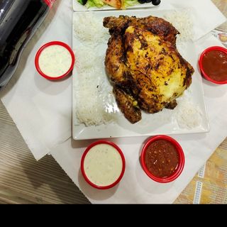 Pollo A L`Ast Entero (2 Uds.) Con Arroz Y Coca-Cola Sabor  Botella 2L.