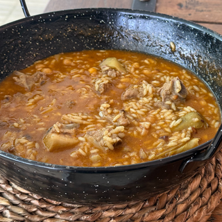 Arroz meloso o en paella de costillita de cerdo