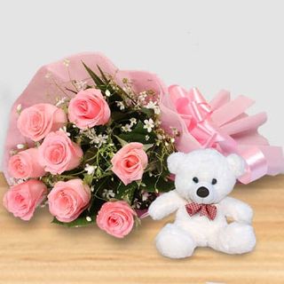 MAZZO DI 21 ROSE ROSA CON PELUCHE