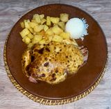 Solomillo de cerdo al ajo tostado gratinado