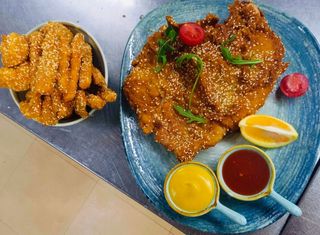 Turkey schnitzel with batata and cauliflower chips