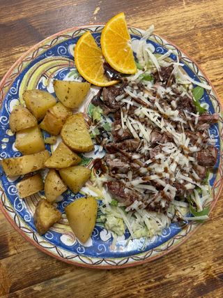 Tagliata di vitello con scaglie di Grana di Padano e glassa balsamica 