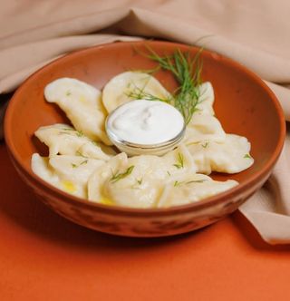 Вареники з м'ясом та сметаною (250/30г)