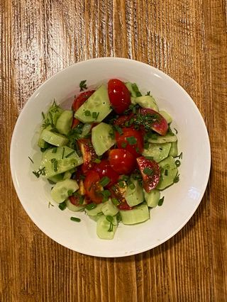 Cucumbers with tomatoes and oil