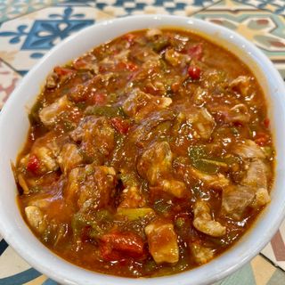 Lomo Con Tomate Y Pimientos