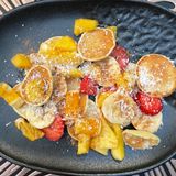 Mini pancakes with fruit salad