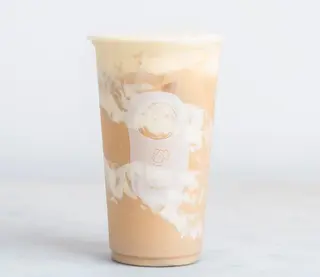Tè al latte con mousse di crema