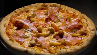 Pizza Crudo e porcini mica