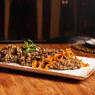 Arroz con pluma ibérica y boletus