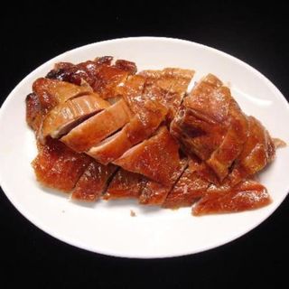 Pato asado con ajo y jengibre