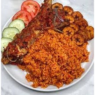 Jollof Rice And Fresh Fish (Catfish)