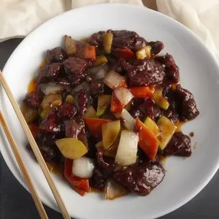 Ternera Con Salsa De Ostras