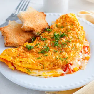 Tortilla De Huevo Con Tomate Y Jamon
