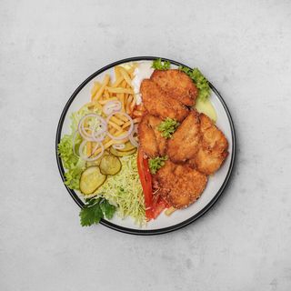 Snitel de pui la farfurie