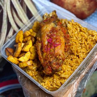 Jollof Rice, Plantain And jumbo Peppered Turkey