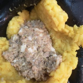 Arancina con ragù bianco di vitello e provola di Agerola affumicata 