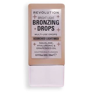Revolution Bright Light Bronzing Drops Scorched Light/Med