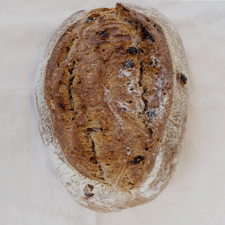 Hogaza ENTERA de siete semillas y pasas.