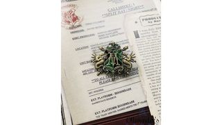 მალფოების საგვარეული გერბის ბროში