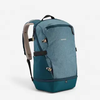 Mountain and trekking backpack with a 20L Quechua NH500 cooler pocket. 20 liters blue