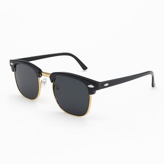 Lunettes de soleil noires à bordure dorée