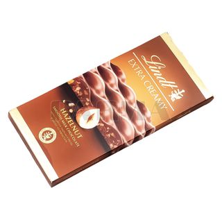 24326 Շոկոլադե սալիկ «Lindt Extra Creamy» կաթնային, պնդուկ 80գ