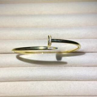 Čvrsta narukvica pozlata šaraf sa cirkonima na vrhu