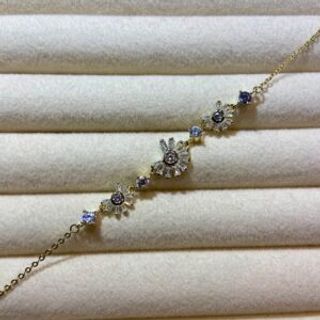 Pozlaćena narukvica tri cvijeta i cirkoni