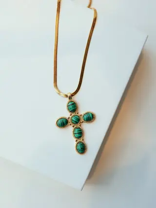 NOIR cross with green details