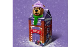 Milka Novogodišnji paketić sa plišanom igračkom 950,5 g