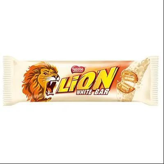 Вафлі Lion з м'якою карамеллю вкриті пластівцями та білою глазур'ю
