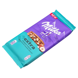 Шоколад MILKA Extra Молочный С лесным орехом миндалем и крошкой кокосового бисквита 130г