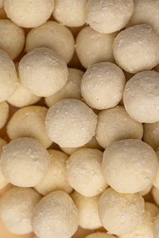 Noisette enrobée de chocolat blanc et noix de coco 100g