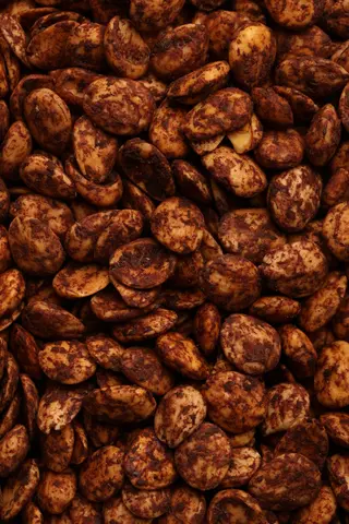 Amandes pelées aux olives noires 100g