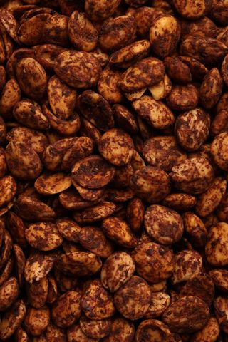 Amandes pelées aux olives noires 100g