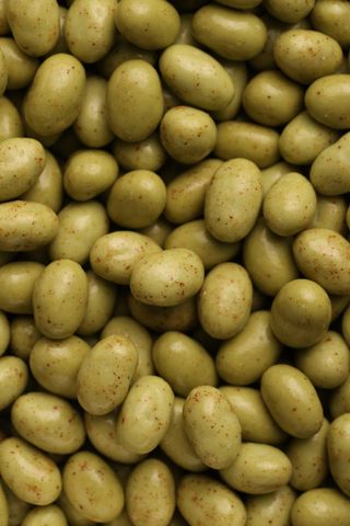 Pistache enrobée de chocolat blanc et cannelle 100g