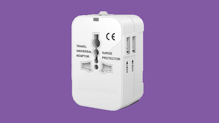 Kouvolsen - Universal Travel Adapter with Dual USB Charging Port