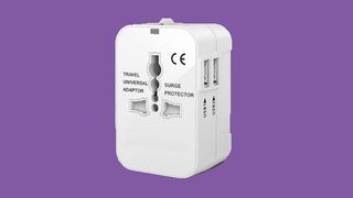 Kouvolsen - Universal Travel Adapter with Dual USB Charging Port