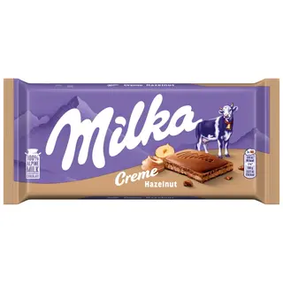 Milka Creme Czekolada mleczna z nadzieniem z orzechów laskowych 85 g