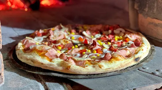 Pizzería +Porciones