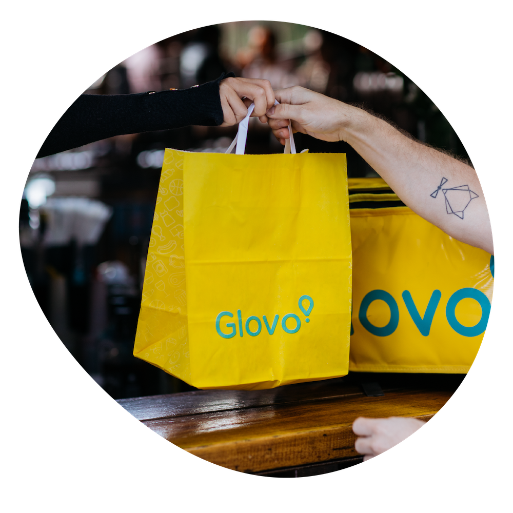 Glovo order in yellow branded paper bag