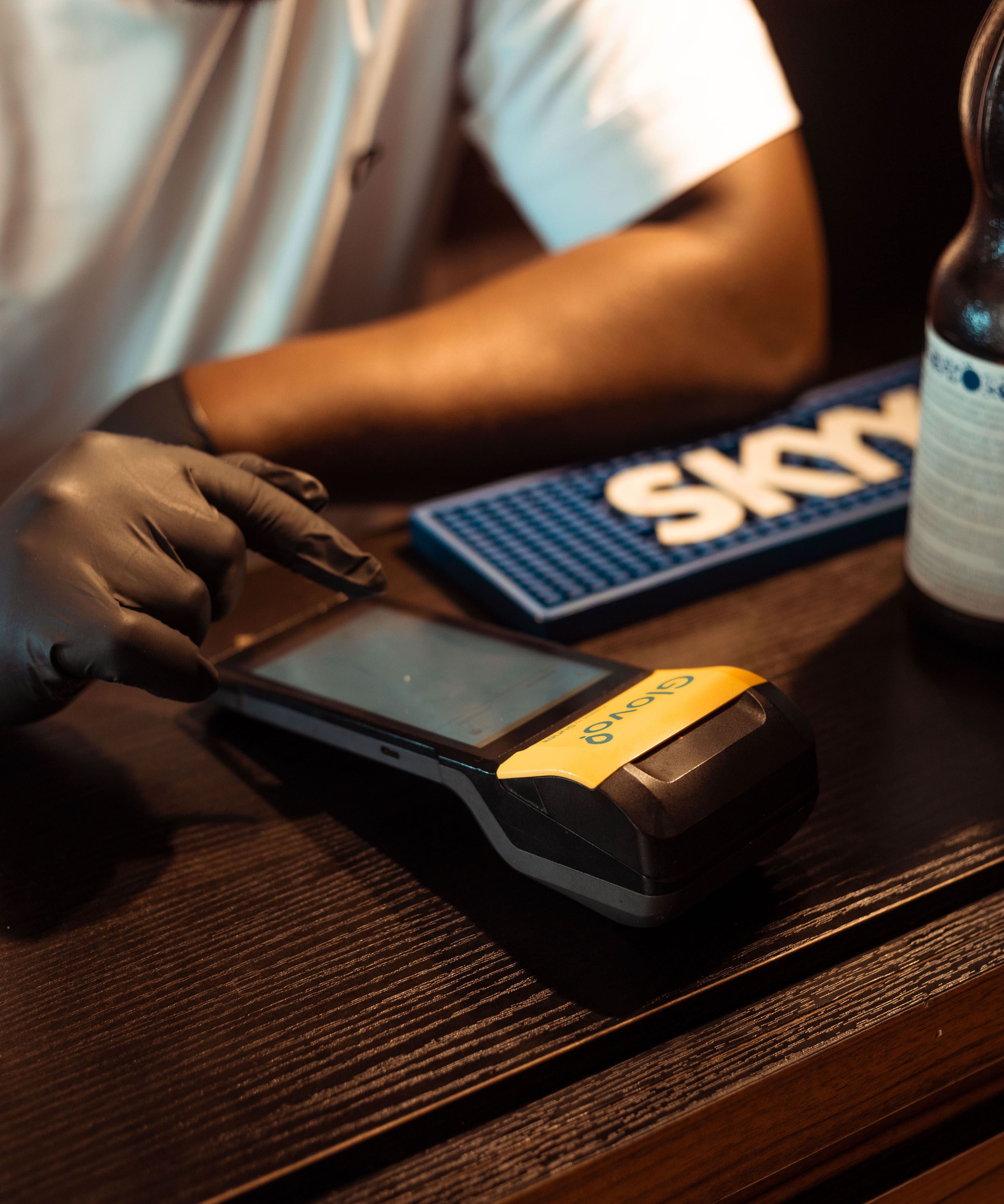 Restaurant manager using Glovo POS machine