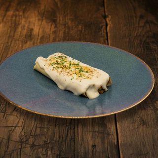 Canelón gratinado con parmesano