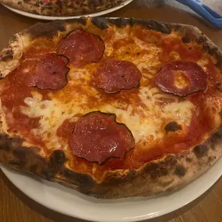 Pizza speck y gorgonzola