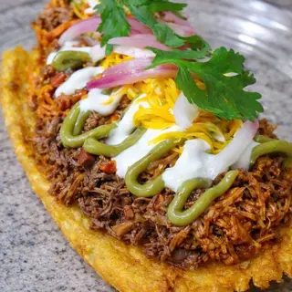 Patacon mixto pollo y ternera