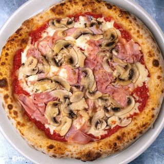 Pizza prosciutto y funghi (30 cm.)