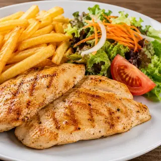 Pechuga de pollo a la plancha o Rebozada